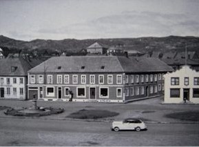 Overview of the building and the neighborhood, old photograph